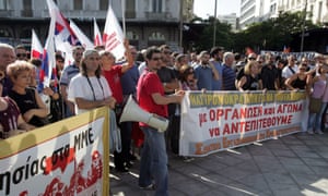 Protesters shout slogans during a demonstration in central Athens, Greece, 18 October 2012.