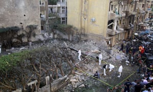 Forensic experts inspect the site of the explosion in Beirut's Ashrafieh neighbourhood.