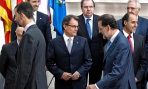 Spain's Crown Prince Felipe (L), and Spanish Prime Minister Mariano Rajoy (front R) walk pass Catalonian regional President Artur Mas (C) among others.