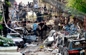 Beirut Car Bomb: Lebanese security forces inspect the damage caused by the car bomb