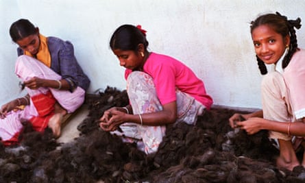 Women at work in a hair processing factory in India