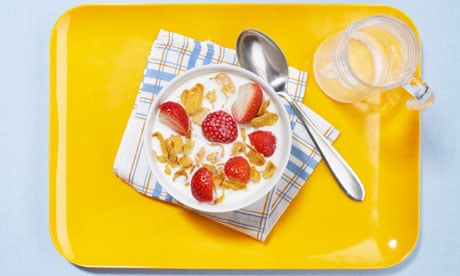 still life of cereals with strawberries in bowl