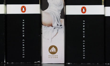 Spines of Penguin books beside a Random House book