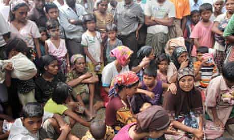 Muslim Rohingya refugees gather at Thechaung camp near Sittwe