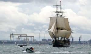 The Bounty joins other tall ships as they depart in a flotilla out of  Belfast docks, Northern Ireland, in 2009.
