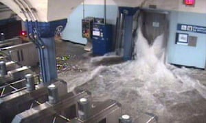 Floodwaters from hurricane Sandy rush down an elevator shaft into Hoboken subway station in New Jersey