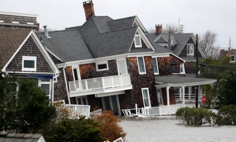 Floodwaters surround homes near the Mantoloking Bridge the morning after Sandy hit Mantoloking, New Jersey.