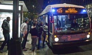 People board a New York City bus, as partial service was restored on Tuesday.