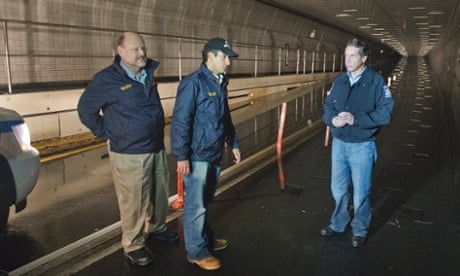 Governor Andrew Cuomo, right, tours the damaged Brooklyn-Battery tunnel with MTA chairman Joseph Lhota (far left) and Jim Ferrara, president of MTA bridges and tunnels.