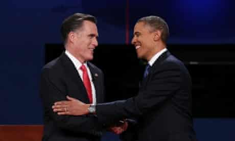 Barack Obama shakes hands with Mitt Romney at the end of the presidential debate in Denver.