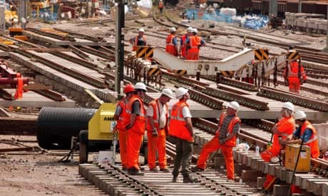 Workers replacing railway track