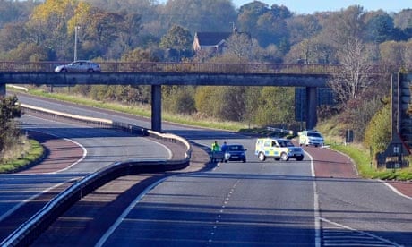 Police at the scene of the murder of a Prison Officer on M1 Motorway, Lurgan, Northern Ireland 
