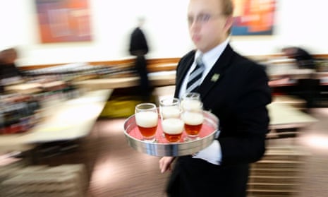A waiter with a tray of beers during the Brussels beer challenge. Brewers from 16 countries gathered for a three-day beer tasting contest.
