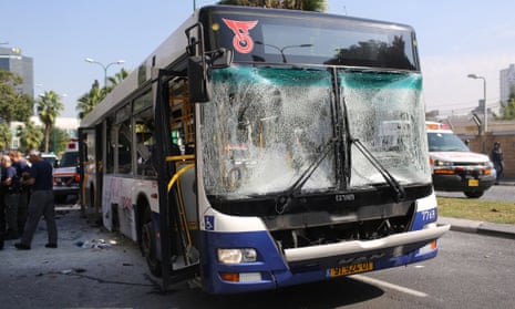 Emergency services rush to the scene of an explosion on a bus in central Tel Aviv, Israel.