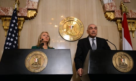 Egyptian foreign minister Mohamed Kamel Amr and US secretary of state Hillary Clinton announce a truce between Hamas and Israel.