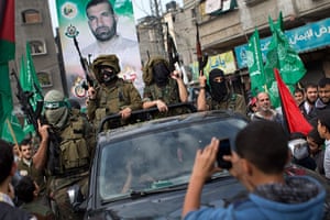 Bernat Armangue: Palestinian Hamas militants during a rally to celebrate the ceasefire