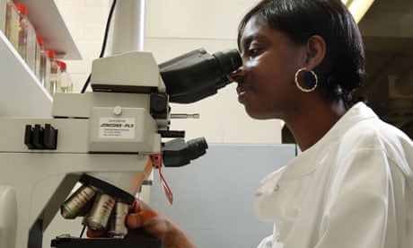 A science student using a microscope