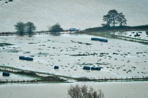 Autumn weather: A vehicle manages to drive across the flooded Somerset Levels 