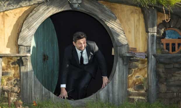 Andy Serkis, who plays Gollum, comes out of the hobbit's home during the film premiere for The Hobbit - An Unexpected Journey in Wellington, New Zealand.