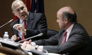 OECD secretary general Jose Angel Gurria (L) and Spanish economy minister Luis De Guindos at their joint press conference. Photograph:  EPA/Paco Campos