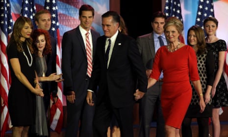 Mitt Romney, his wife Ann and family walk off of stage after his concession speech in Boston.