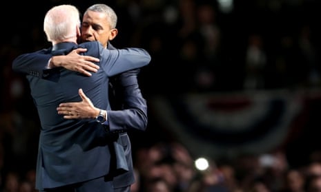 Barack Obama andVice President Joe Biden embrace on stage after his victory speech.