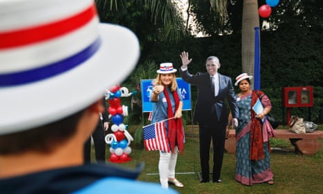 US citizen Heidi Molback next to a cutout of President Barack Obama by the US Embassy in New Delhi, India.