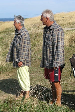 Big Picture: Couples: A couple dressed in matching check shirts