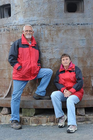 Big Picture: Couples: A couple dressed in matching red and black waterproof jackets