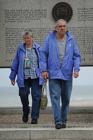Big Picture: Couples: A couple dressed in matching lilac waterproof coats
