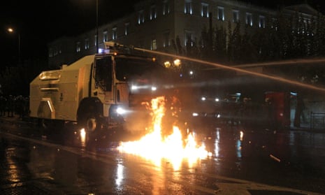 epa03462136 A water cannon truck is used against demonstrators near the Greek Parliament, Athens, Greece, 07 November 2012.