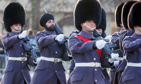 Scots Guardsman Jatenderpal Singh Bhullar parades at Buckingham Palace for the first time