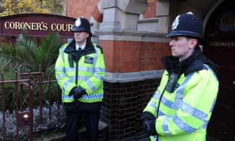 Police outside the coroner's court where the inquest into the death of Jacintha Saldanha was held