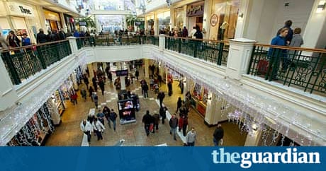 Holiday shop Christmas shoppers coaxed to spend by E-Santa and a sackful of