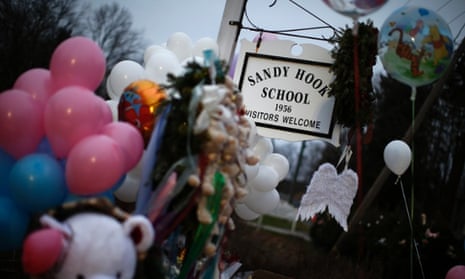 A makeshift memorial near the entrance to the Sandy Hook Elementary School for the victims of a school shooting in Newtown, Connecticut.