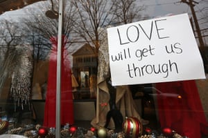 Sandy Hook: A sign hangs in the window of a clothing store in Newtown
