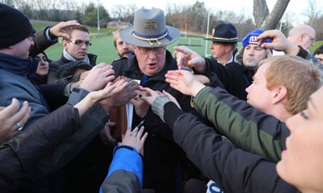 Lieutenant Paul Vance of the Connecticut State Police is surrounded by reporters