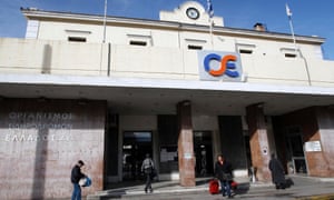 Commuters walk outside a closed Athens railway station during a 48-hour strike by the Greek railway organisation in Athens December 19, 2012.