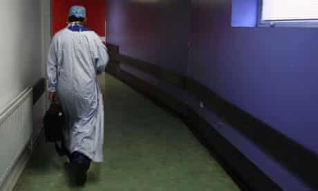 Surgeon walking in hospital corridor