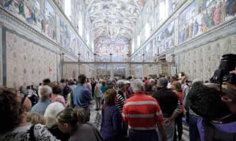 Tourists in the Sistine Chapel