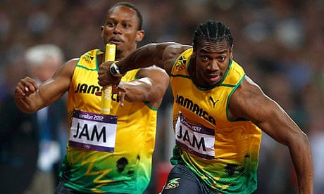 Yohan Blake receives baton from Michael Frater in men's 4x100m relay final at the 2012 Olympic Games