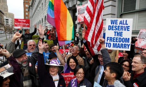 Gay Marriage advocates cheer during a rally moments before hearing the news of the Proposition 8 over-ruling outside the Ninth Circuit Courthouse in San Francisco, California, 7 February 2012.