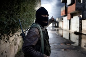 Al-Qusayr Syria: A member of the Free Syrian Army in Al-Qusayr
