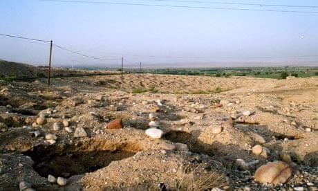 A looted cemetery in Jordan in 2004. Copyright: Neil Brodie