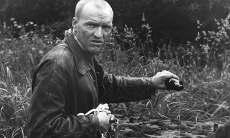 Man in a field, a still from Tarkovsky's film Stalker, 1979