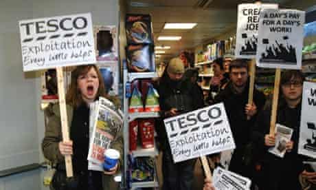 People occupy a Tesco store in Westminster in protest at the government's work experience scheme