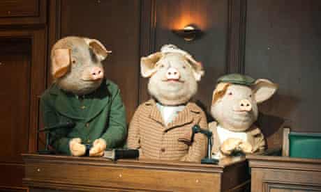 Three little pigs in the dock from the Guardian's get the whole picture advertising campaign