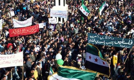 Demonstrators protest against Syria's Bashar al-Assad in the town of Hula near Homs, 3 February 2012