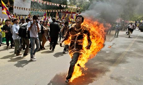 Tibetan sets himself on fire outside Indian parliament | India | The Guardian