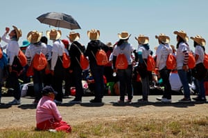 Pope visit to Mexico: Pilgrims take a break as they walk towards Bicentennial Park